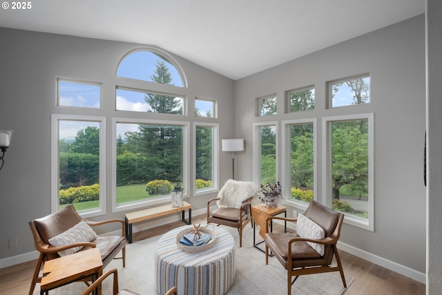6600 NW Burgundy Dr, Corvallis, OR 97330 - sitting room with lofted ceiling, light wood finished floors, and baseboards