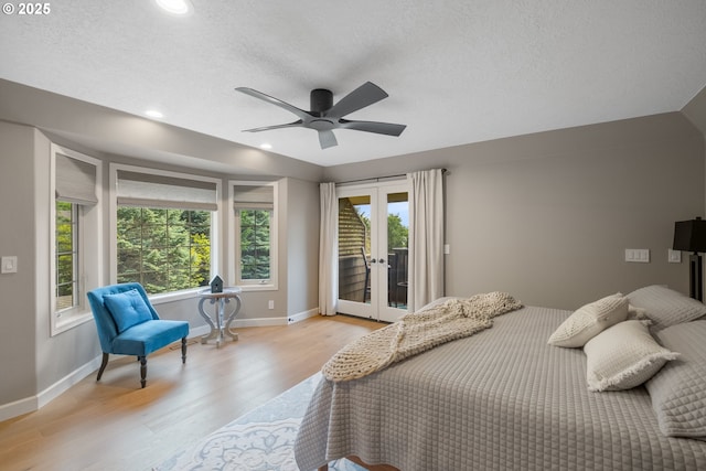 6600 NW Burgundy Dr, Corvallis, OR 97330 - bedroom with light wood-style flooring, access to outside, multiple windows, french doors, and recessed lighting