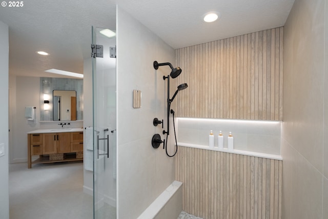 6600 NW Burgundy Dr, Corvallis, OR 97330 - bathroom with a shower stall, vanity, and recessed lighting