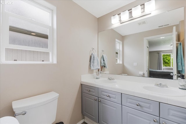525 SW 207th Ave, Beaverton, OR 97006 - bathroom featuring toilet and double vanity