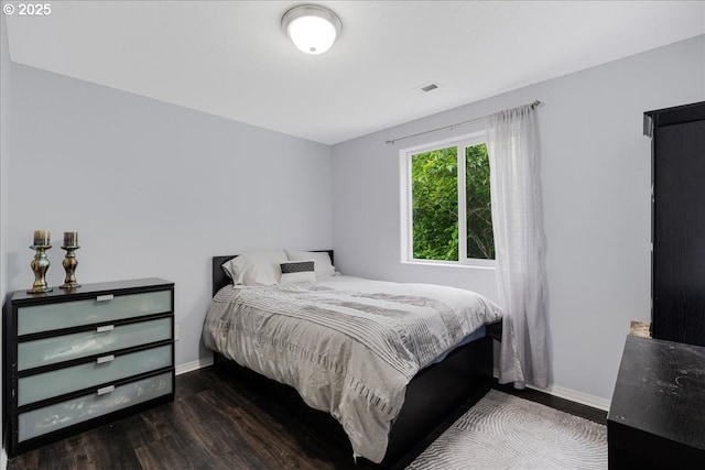 525 SW 207th Ave, Beaverton, OR 97006 - bedroom featuring baseboards and wood finished floors