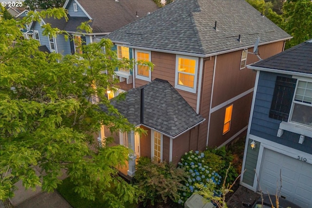 525 SW 207th Ave, Beaverton, OR 97006 - view of home's exterior with roof with shingles