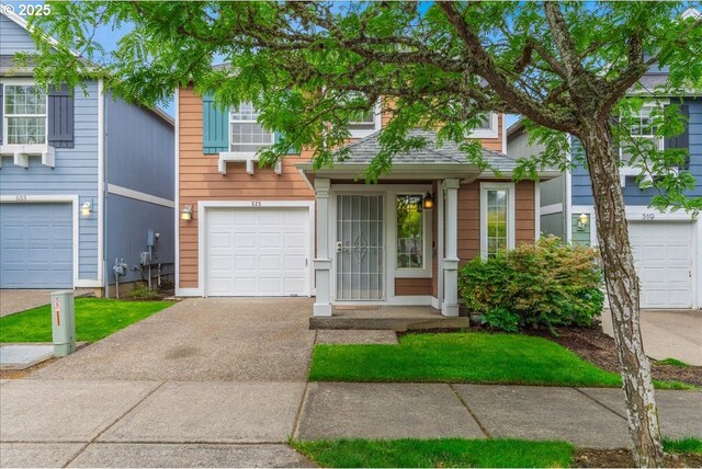 525 SW 207th Ave, Beaverton, OR 97006 - view of front of house featuring concrete driveway and an attached garage
