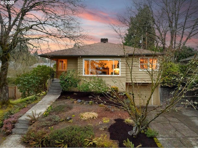 view of front of house with a garage and driveway