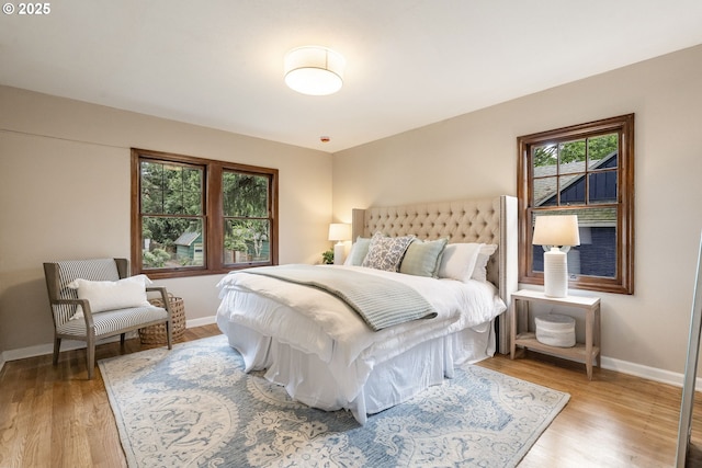5932 NE 29th Ave, Portland, OR 97211 - bedroom featuring baseboards and light wood finished floors