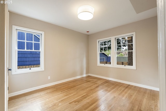 5932 NE 29th Ave, Portland, OR 97211 - spare room featuring baseboards and light wood-type flooring