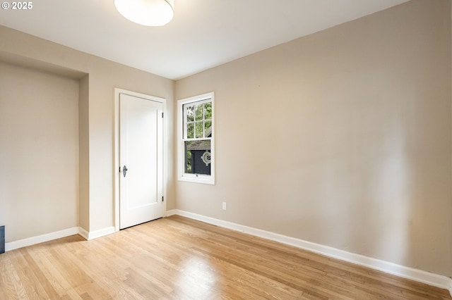 5932 NE 29th Ave, Portland, OR 97211 - unfurnished bedroom with light wood finished floors and baseboards