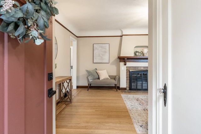 5932 NE 29th Ave, Portland, OR 97211 - foyer featuring light wood-type flooring and a brick fireplace