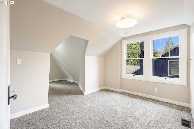 5932 NE 29th Ave, Portland, OR 97211 - additional living space with vaulted ceiling, carpet floors, and baseboards