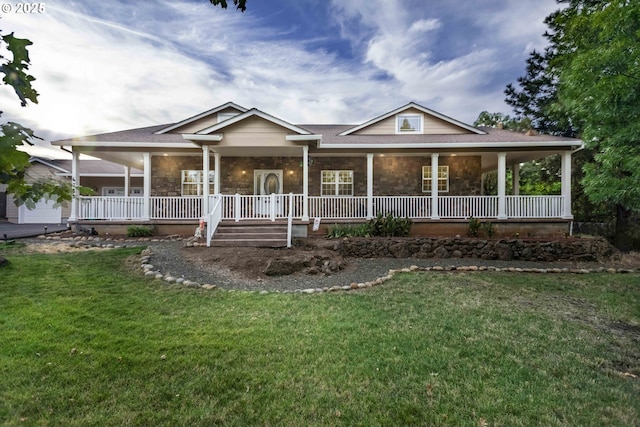 6783 Rogue River Dr, Shady Cove, OR 97539 - country-style home with covered porch, a front yard, and stone siding