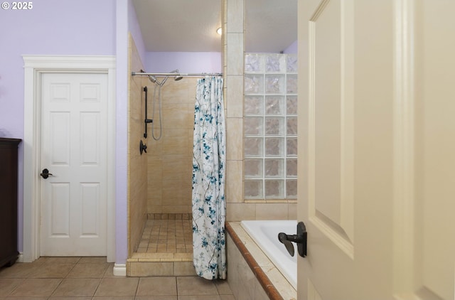 6783 Rogue River Dr, Shady Cove, OR 97539 - bathroom featuring tiled shower, tile patterned floors, and a garden tub