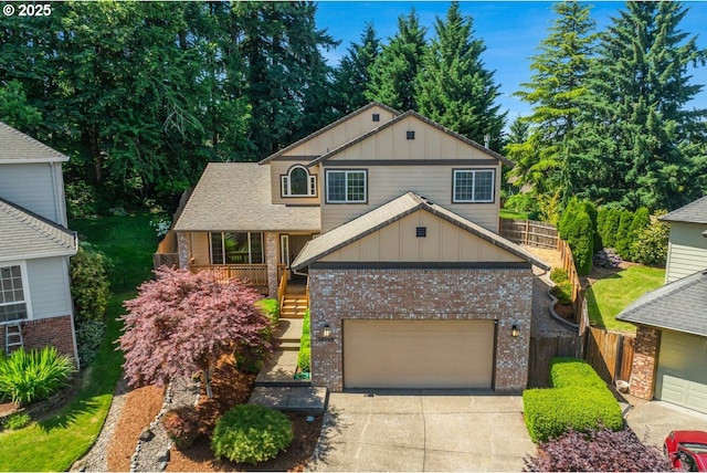 18169 SW Shady Meadow Ct, Beaverton, OR 97007 - view of front of property featuring board and batten siding, brick siding, concrete driveway, and a shingled roof