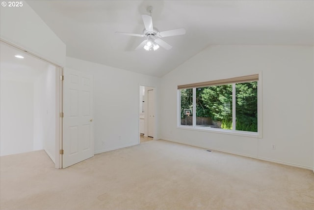 18169 SW Shady Meadow Ct, Beaverton, OR 97007 - unfurnished bedroom featuring carpet, lofted ceiling, baseboards, connected bathroom, and a ceiling fan