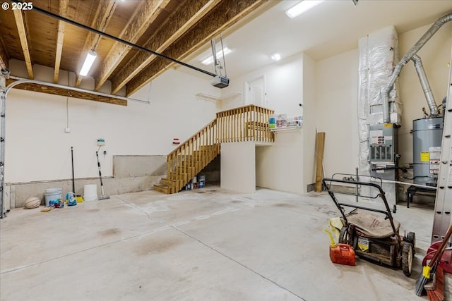 18169 SW Shady Meadow Ct, Beaverton, OR 97007 - garage featuring a garage door opener and water heater