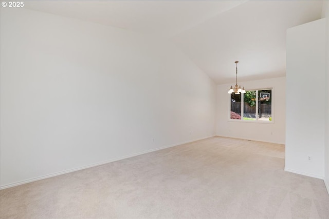 18169 SW Shady Meadow Ct, Beaverton, OR 97007 - spare room featuring light carpet, a chandelier, lofted ceiling, and baseboards