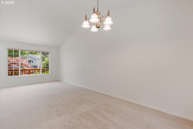 18169 SW Shady Meadow Ct, Beaverton, OR 97007 - unfurnished room with lofted ceiling, light colored carpet, a chandelier, and baseboards