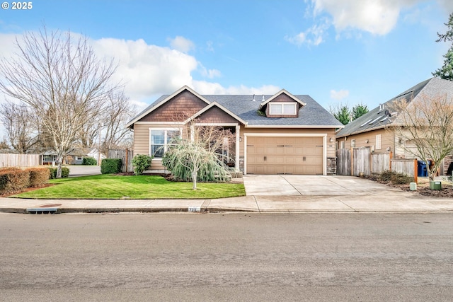 view of front facade featuring a garage and a front yard