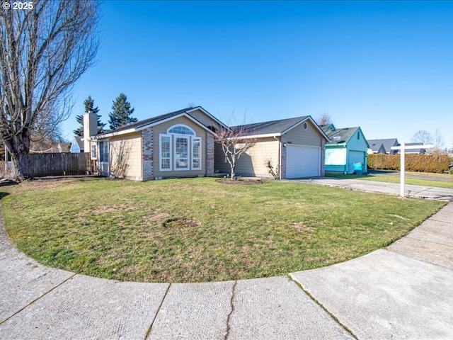 single story home with a garage and a front lawn