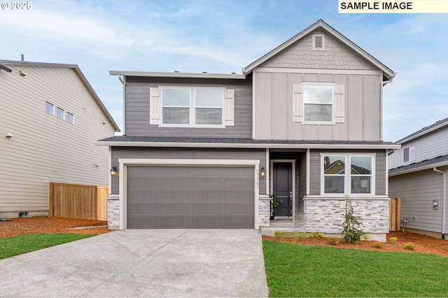 17269 SW Atfalati Ln Unit 36, Sherwood, OR 97140 - craftsman house featuring board and batten siding, stone siding, an attached garage, and driveway