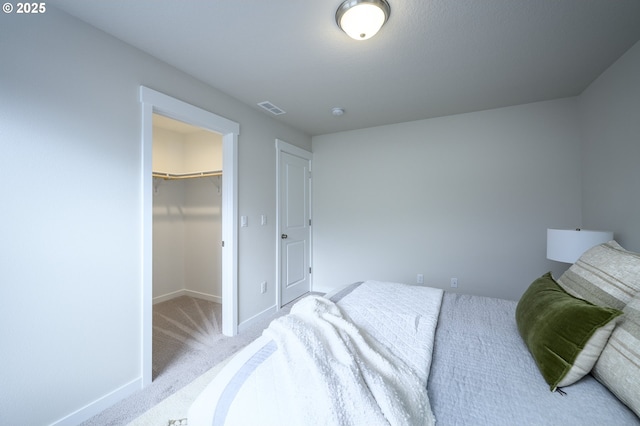 17269 SW Atfalati Ln Unit 36, Sherwood, OR 97140 - bedroom featuring a spacious closet, carpet, and a closet
