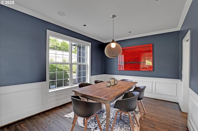 1811 NW Rosefinch Ln, Portland, OR 97229 - dining room featuring wainscoting, wood finished floors, ornamental molding, and a textured ceiling