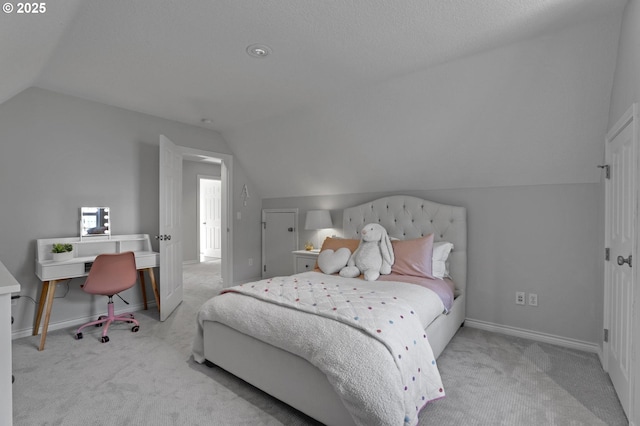1811 NW Rosefinch Ln, Portland, OR 97229 - carpeted bedroom with lofted ceiling, a desk, and baseboards