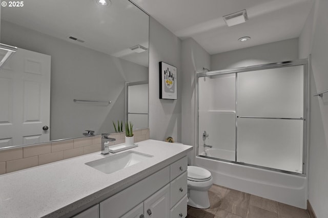 1811 NW Rosefinch Ln, Portland, OR 97229 - bathroom with toilet, vanity, enclosed tub / shower combo, and recessed lighting