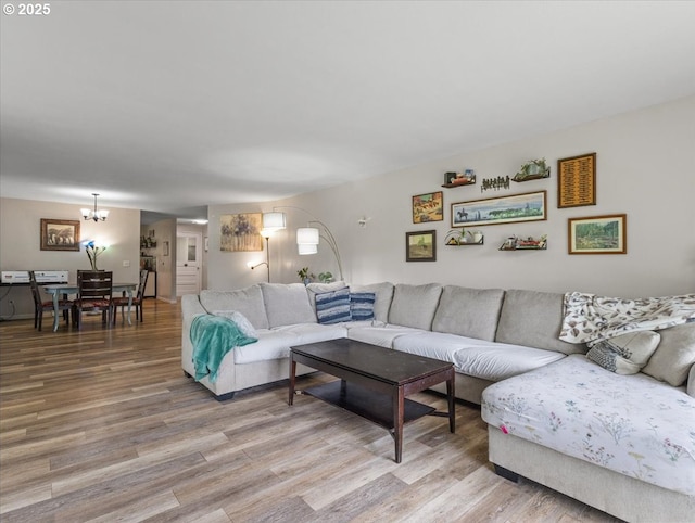 17610 SE 362nd Dr, Sandy, OR 97055 - living area featuring light wood-style flooring and a chandelier
