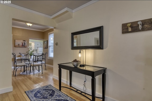 5120 NE Glisan St, Portland, OR 97213 - dining space featuring light wood-style floors, crown molding, and baseboards