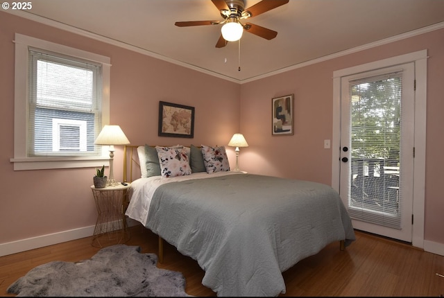 5120 NE Glisan St, Portland, OR 97213 - bedroom featuring light wood finished floors, ornamental molding, ceiling fan, a closet, and access to outside