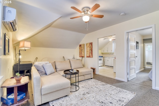 5120 NE Glisan St, Portland, OR 97213 - living area featuring a ceiling fan, carpet, an AC wall unit, vaulted ceiling, and baseboards