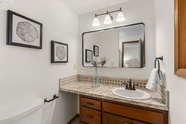 half bath featuring toilet, backsplash, and vanity