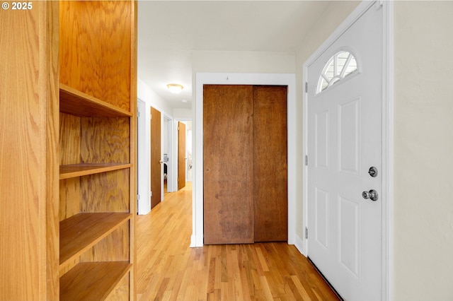 hallway featuring light wood-type flooring