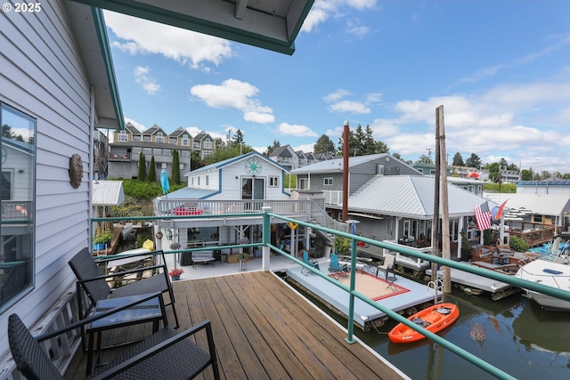 deck featuring a water view