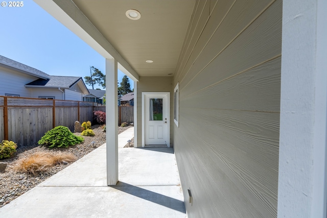 4080 Caddington Ln, Florence, OR 97439 - view of exterior entry featuring a patio