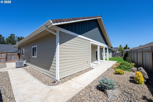 4080 Caddington Ln, Florence, OR 97439 - view of property exterior featuring a patio area and a fenced backyard