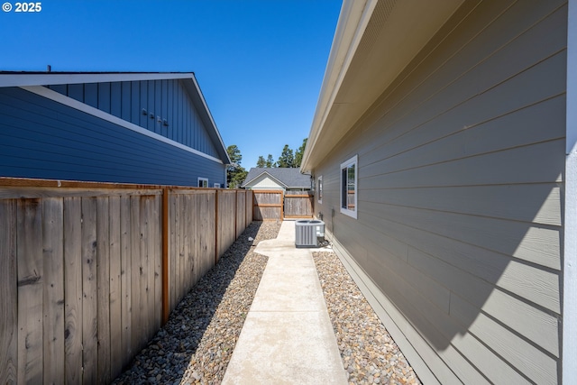 4080 Caddington Ln, Florence, OR 97439 - view of side of home with a fenced backyard and board and batten siding