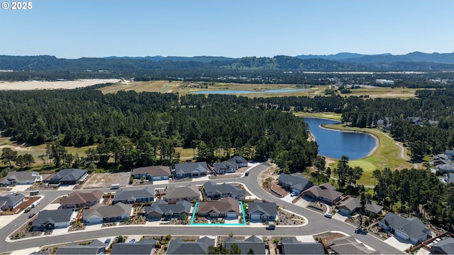 4080 Caddington Ln, Florence, OR 97439 - aerial overview of property's location featuring a water and mountain view, nearby suburban area, and property parcel outlined