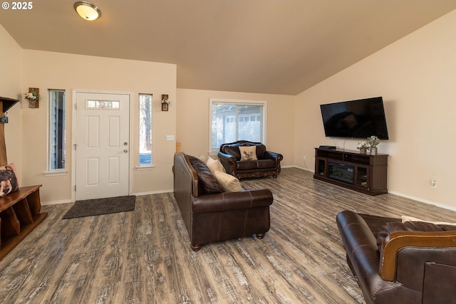 16050 Dick Rd, La Pine, OR 97739 - living room featuring wood finished floors and vaulted ceiling
