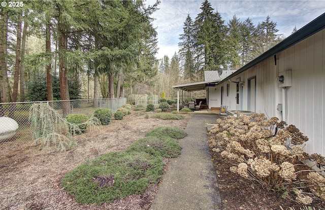 view of yard featuring a patio area and fence