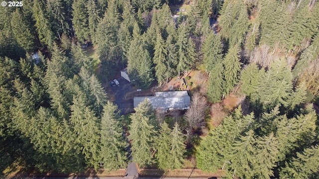 aerial view featuring a forest view