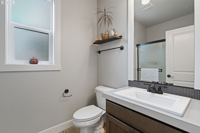 12721 Cottonwood Ave, Oregon City, OR 97045 - bathroom featuring vanity, an enclosed shower, and decorative backsplash
