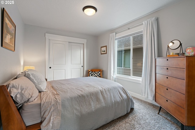 12721 Cottonwood Ave, Oregon City, OR 97045 - carpeted bedroom with a closet and baseboards