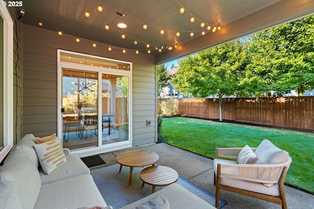 12721 Cottonwood Ave, Oregon City, OR 97045 - fenced backyard featuring an outdoor hangout area and a patio