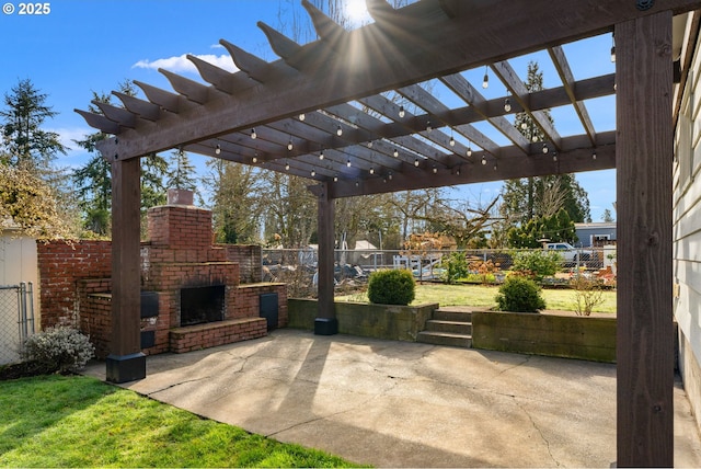 view of patio featuring an outdoor brick fireplace, fence, and a pergola