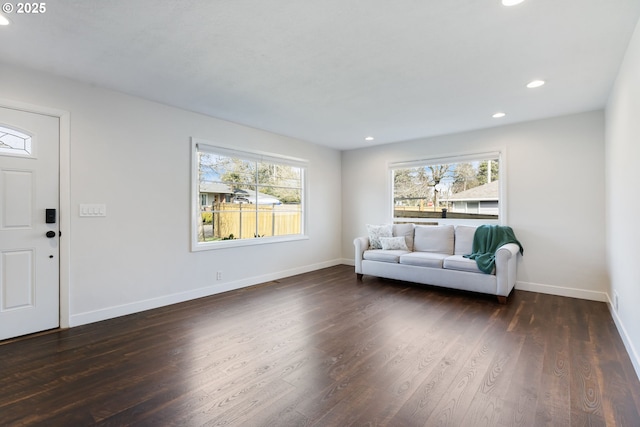 interior space with recessed lighting, dark wood-style flooring, and baseboards