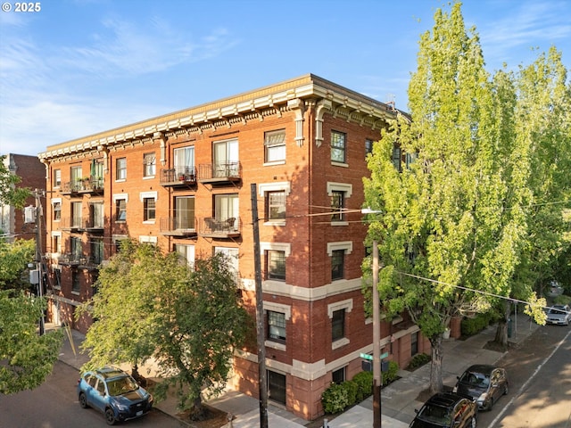 1829 NW Lovejoy St Unit 209, Portland, OR 97209 - view of apartment building / complex