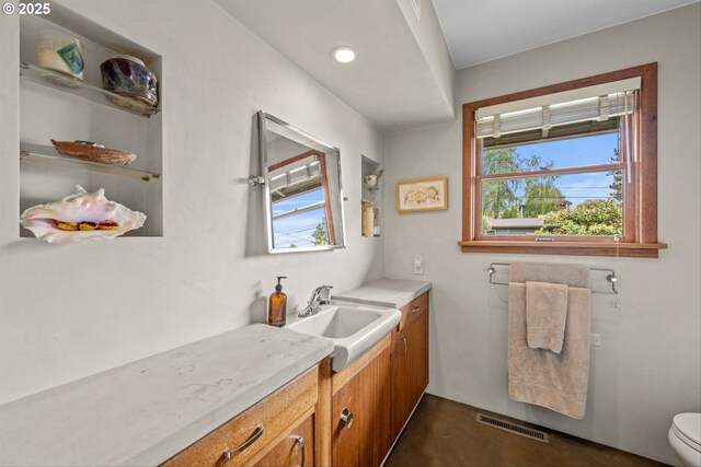3905 NE Holman St, Portland, OR 97211 - bathroom featuring plenty of natural light, vanity, and toilet