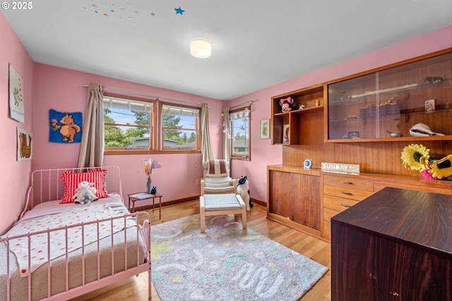 3905 NE Holman St, Portland, OR 97211 - bedroom with light wood-style floors and baseboards