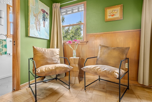 3905 NE Holman St, Portland, OR 97211 - sitting room featuring wainscoting and wooden walls